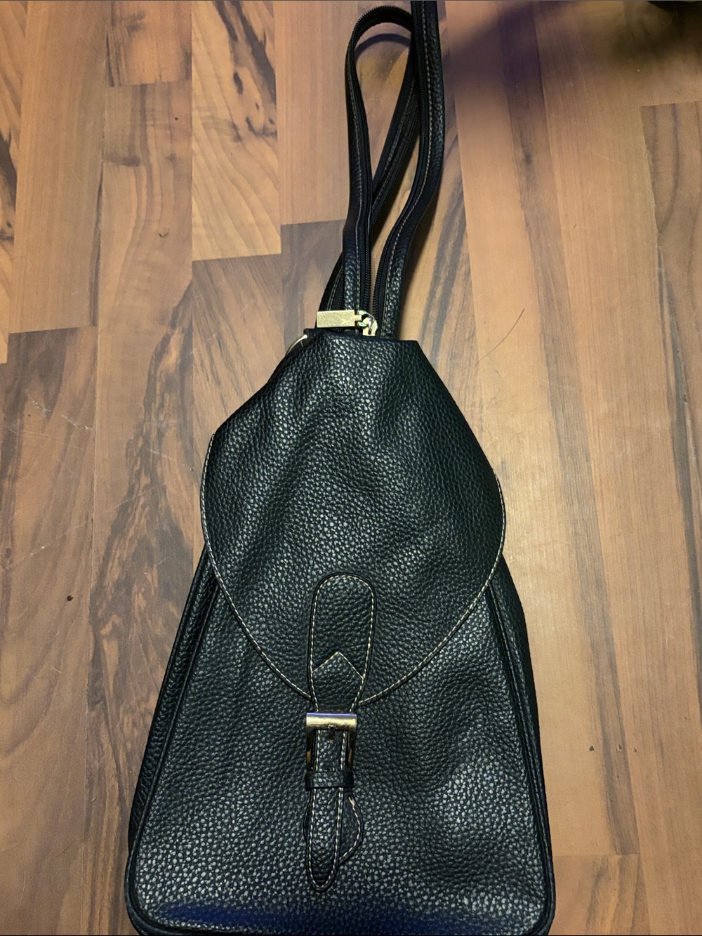 Unk Black Pebbled Leather Sling Backpack with Gold Hardware